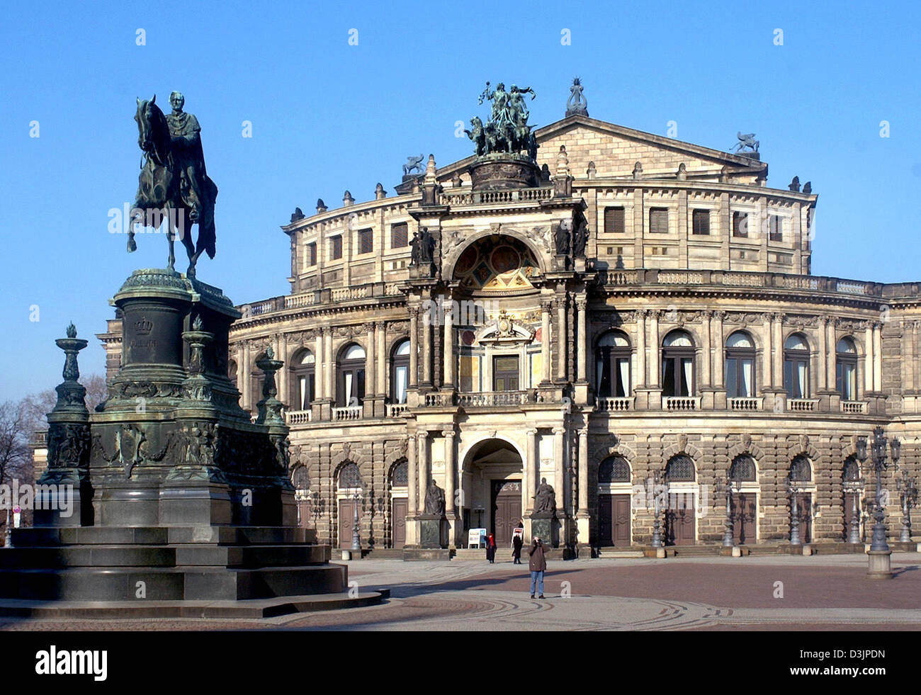 (dpa) - Semperoper (opera house) pictured with the statue of King Johann of Saxony in Dresden, Germany, 09 February 2005. The opera house, which was destroyed in the Second World War and rebuiult according to the blue prints of Gottfried Semper (1803 - 1879) was reopened 20 years ago on 13 February 1985. Stock Photo