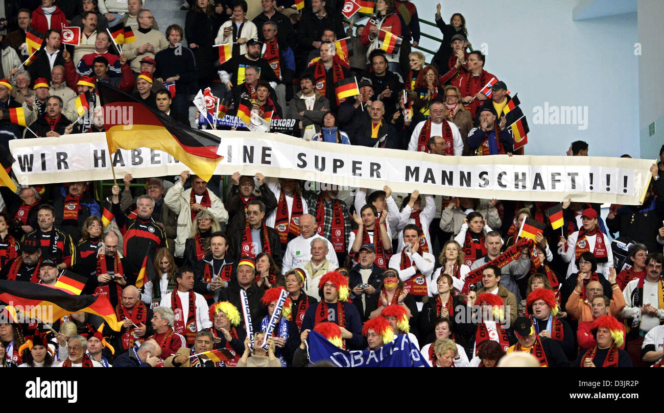 (dpa) - German fans hold a banner featuring the inscription 'Wir haben eine super Mannschaft!' (we have a great team!) during the Men's Team Handball World Championships in Nabeul, Tunisia, 31 January 2005. Spain won against Germany 32-28. Stock Photo