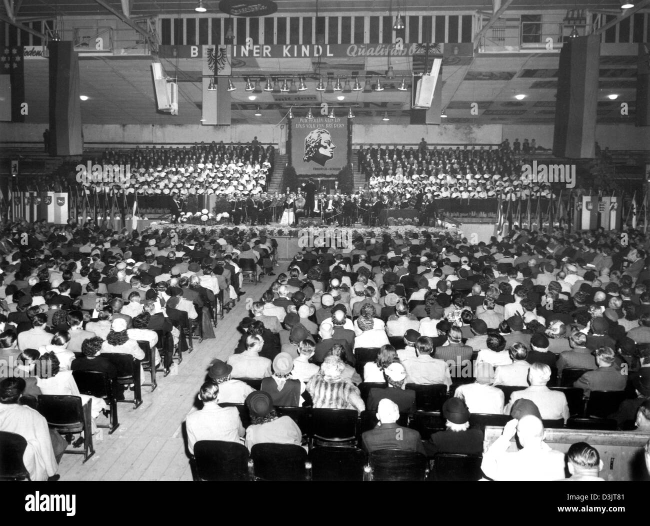 (dpa files) - Guests attend the 150th commemoration of the death of German dramatist and poet Friedrich Schiller at the 'Sportpalast' venue in Berlin, 8 May 1955. Friedrich Schiller was born on 10 November 1759 in Marbach, southern Germany and died on 9 May 1805 in Weimar, Germany. Some of his famous work include 'The Robbers' and the 'Wallenstein' trilogy. Stock Photo