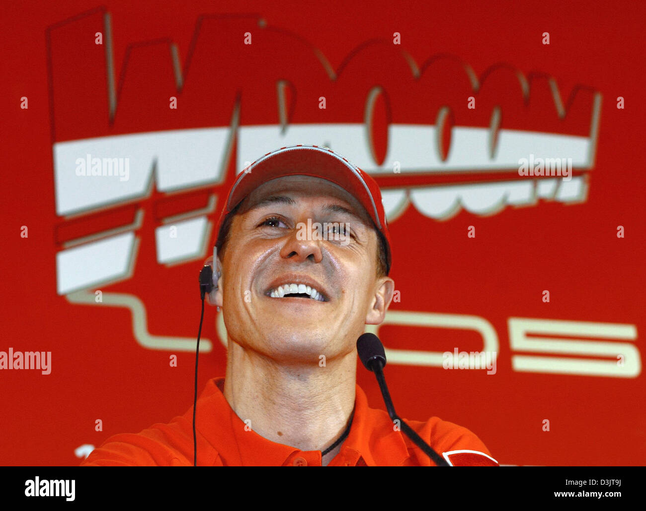 (dpa) - German formula one driver Michael Schumacher smiles during a