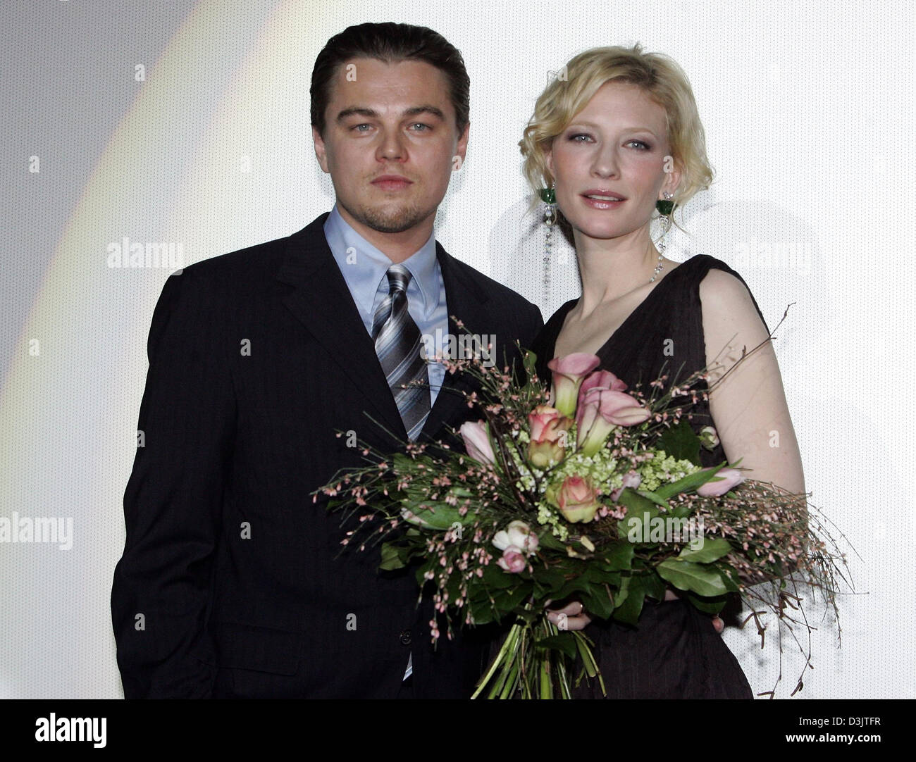 (dpa) - US actor Leonardo DiCaprio stands next to his Australian colleague Cate Blanchett after the German premiere of their film 'Aviator' at the Delphi cinema in Berlin, Germany, 7 January 2005. Stock Photo