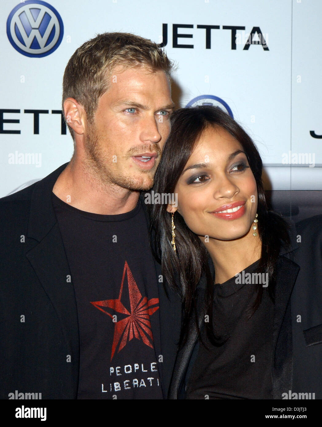 (dpa) - US actress Rosario Dawson (R) and Jason Lewis attend an evening reception for the world premiere of the new Volkswagen Jetta model in Los Angeles, USA, 5 January, 2005. The Jetta was presented to the American market at the Los Angeles Motor Show. Stock Photo