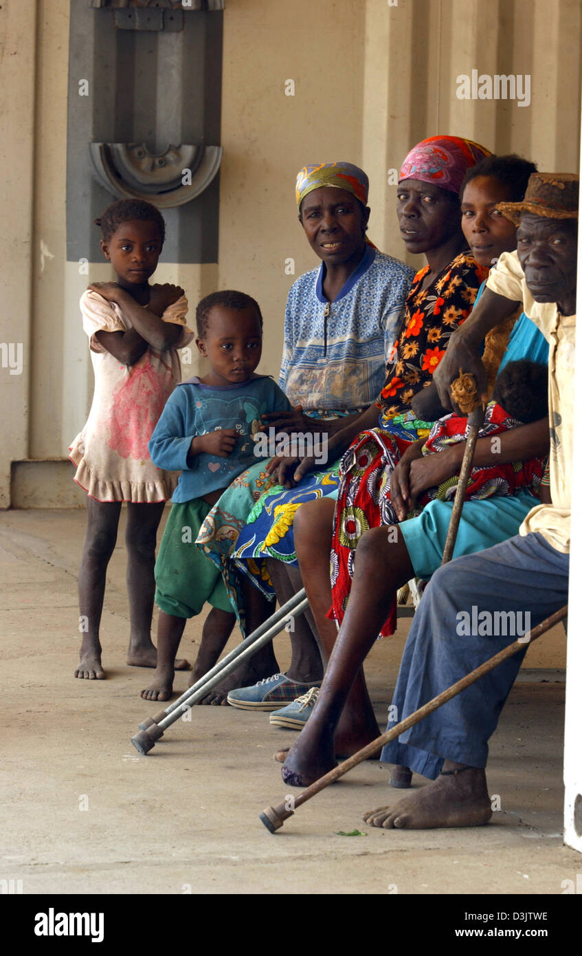 (dpa) - The waiting room in the hospital in the destroyed city of Kuito, Angola, about two hours by plane from the capital Luanda. People that were the victims of landmines are waiting to be fitted with tailor-made leg prosthesises. Photo taken on 03 September, 2003. In the ten years until a ceasefire was reached, heavy fighting in and around Kuito killed around a third of the 500. Stock Photo