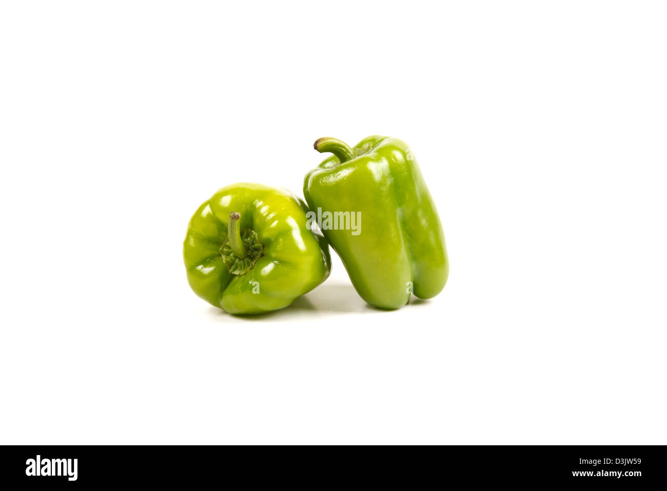 Green bell peppers isolated on white Stock Photo Alamy