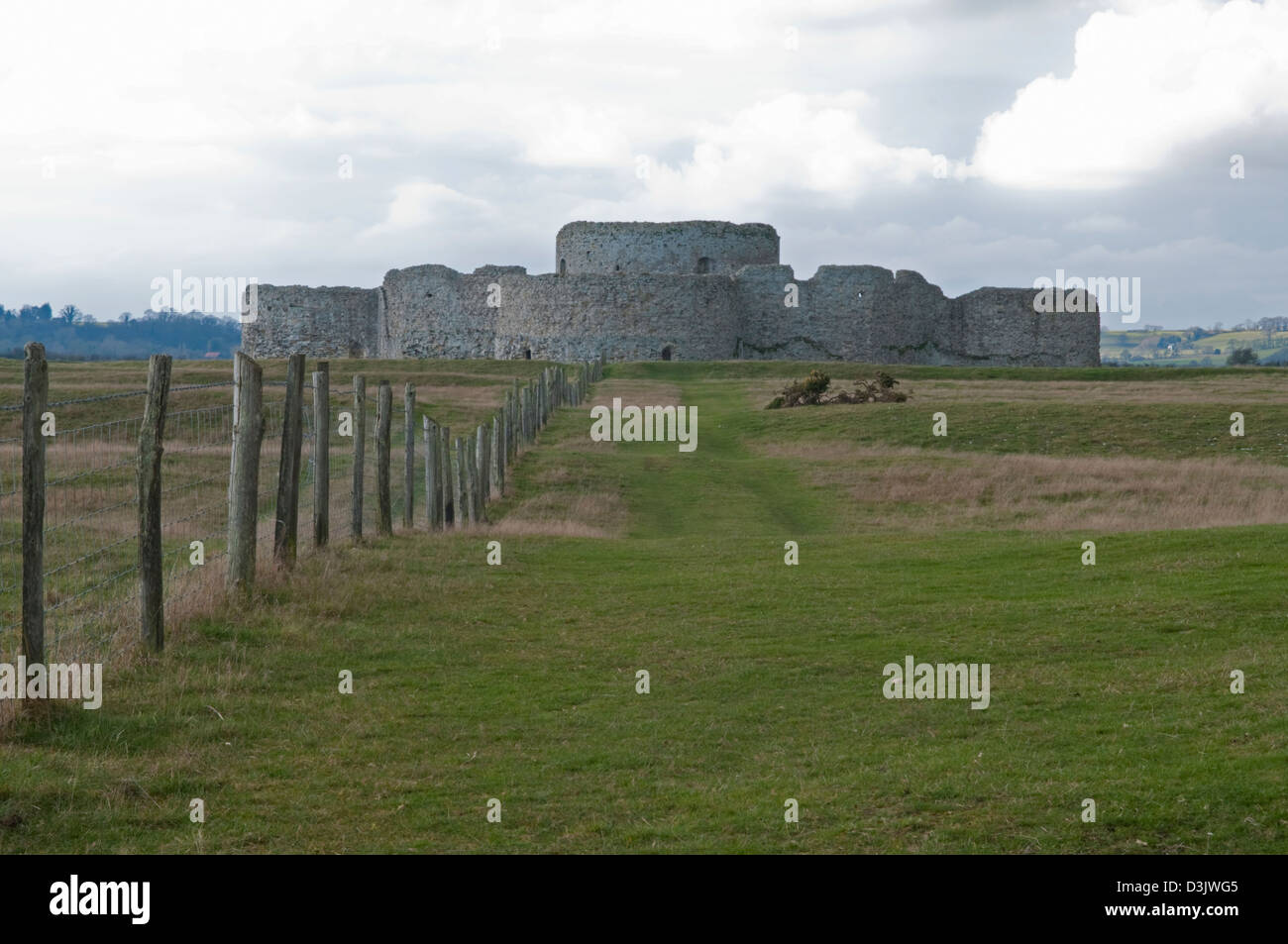 Camber Castle, Rye, East Sussex in sunshine with rolling storm clouds behind Stock Photo
