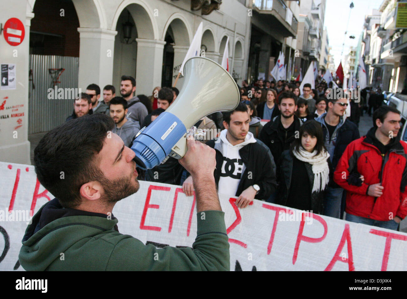 Patras, Greece. 20th February 2013.  Protesters shouting slogans and marching through the city of Patras, Greece during a 24 hour strike called by the trade union confederations of GSEE and ADEDY. Credit:  Art of Focus / Alamy Live News Stock Photo