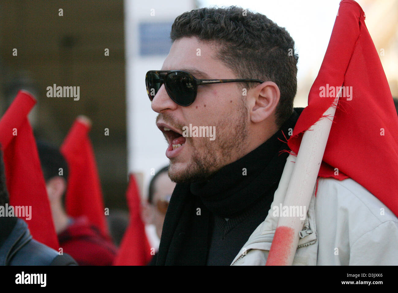 Patras, Greece. 20th February 2013.  Protesters shouting slogans and marching through the city of Patras, Greece during a 24 hour strike called by the trade union confederations of GSEE and ADEDY. Credit:  Art of Focus / Alamy Live News Stock Photo