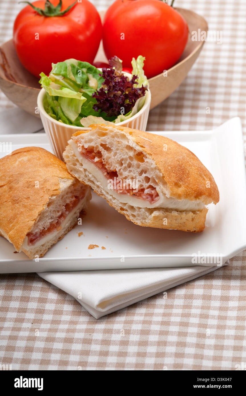 Italian ciabatta panini sandwich with parma ham and tomato Stock Photo