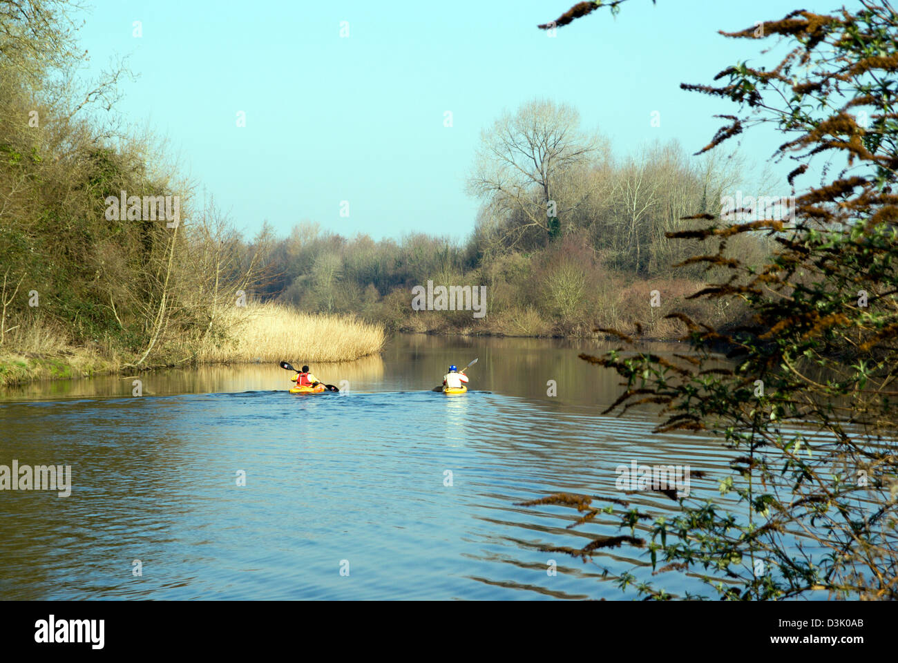 two kayaks on River Ely from the Ely Trail Footpath, Cardiff, South Wales. Stock Photo