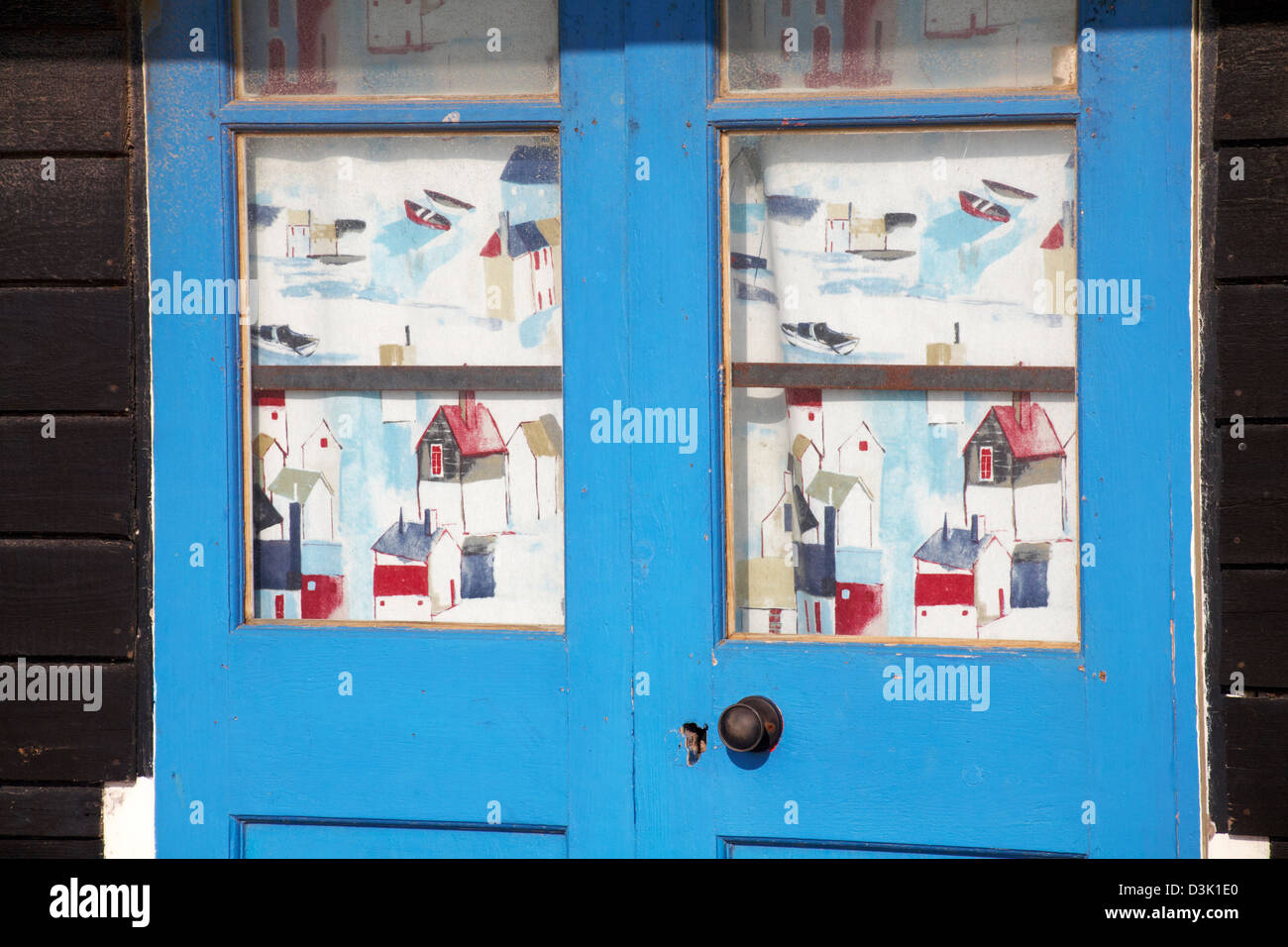 curtains hanging at door of beach hut along Bournemouth promenade in February Stock Photo Alamy