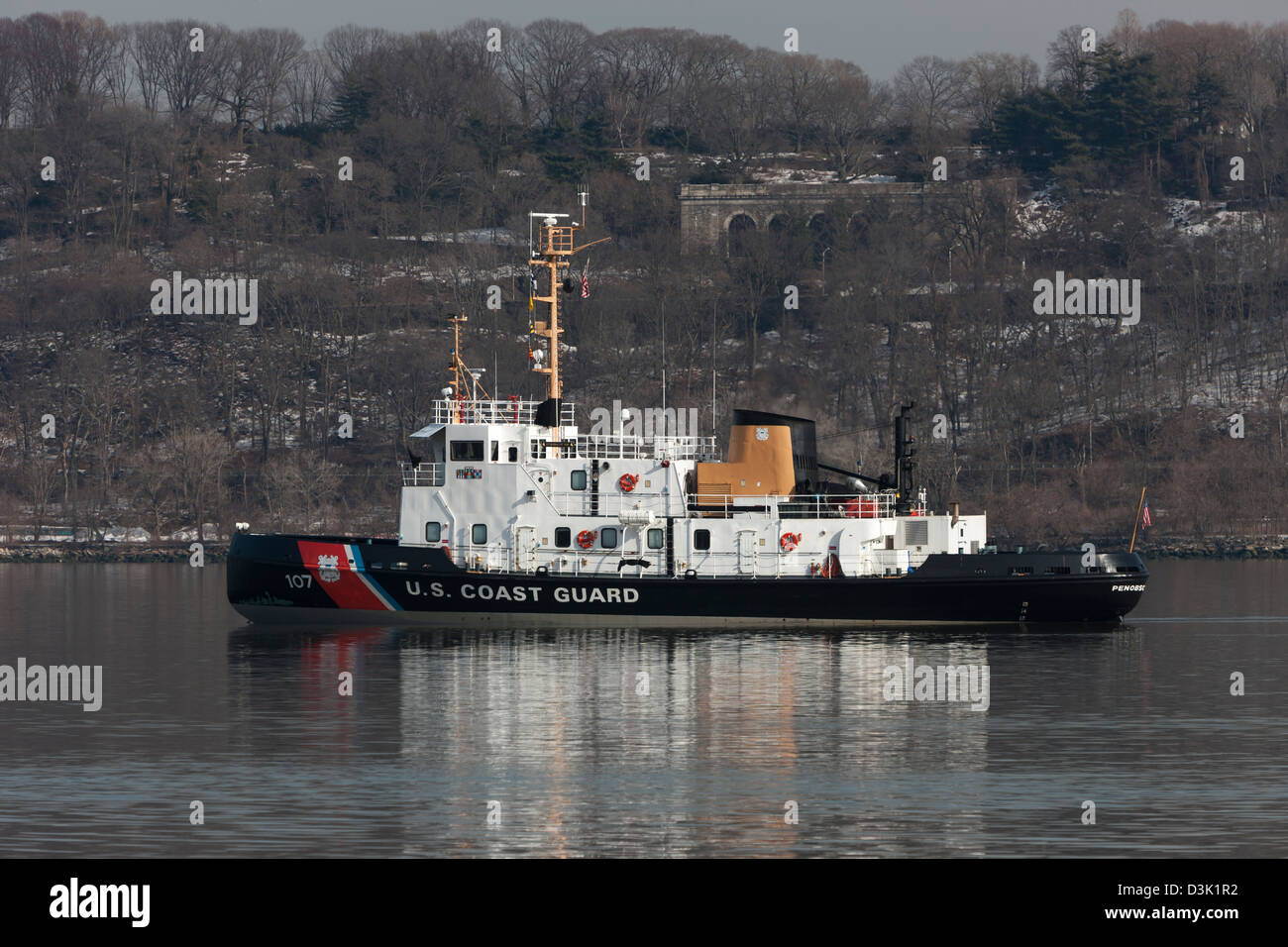US Coast Guard Cutter Penobscot Bay, a small icebreaker, sits at anchor on the Hudson River, ready for icebreaking duty. Stock Photo