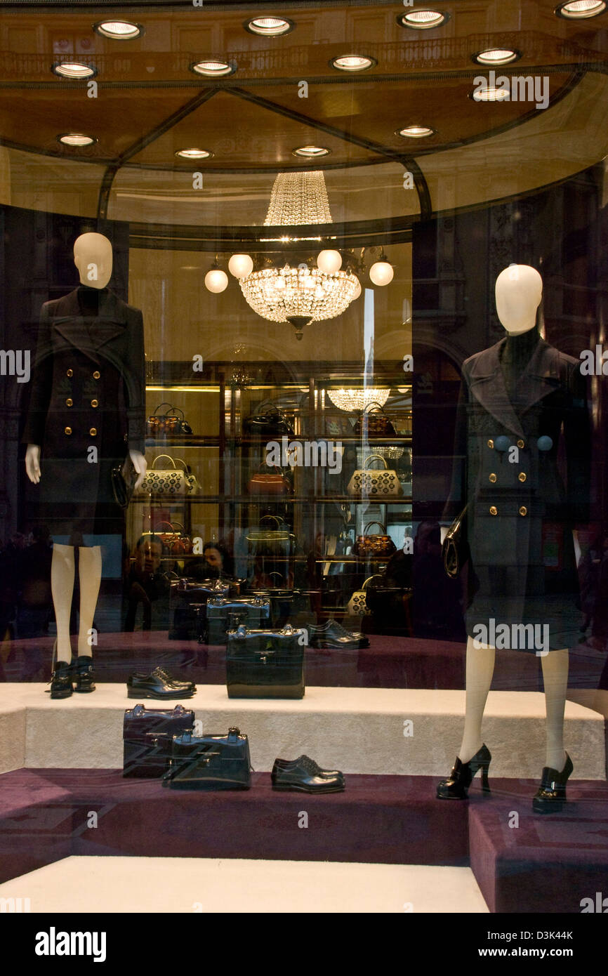 Prada storefront display with womens fashions and accessories Galleria Vittorio Emanuele Milan Lombardy Italy Europe Stock Photo