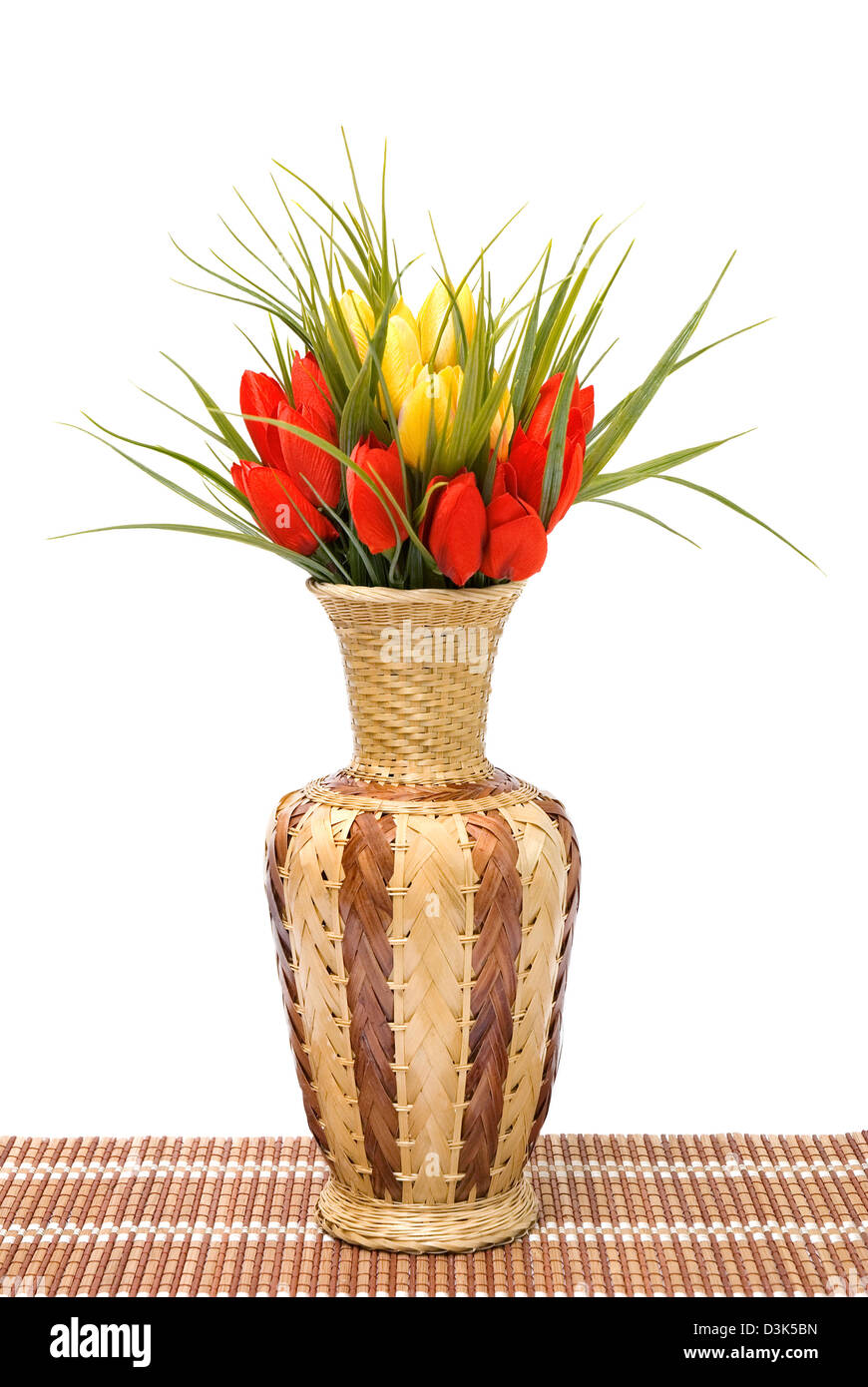 Vase with red and yellow flowers Stock Photo