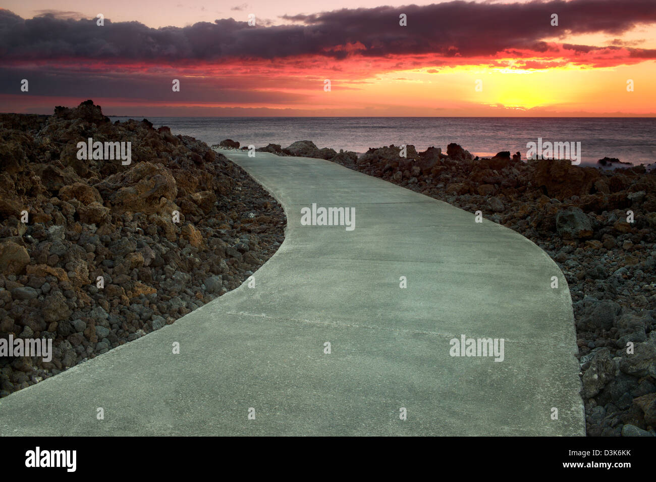 Path and ocean. The Kohala Coast, Hawaii, The Big Island. Stock Photo