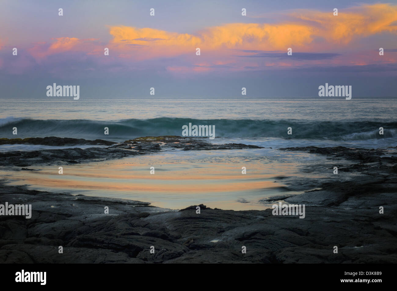 Tidepool reflection with sunrise. The Kohala Coast. The Big Island, Hawaii. Stock Photo