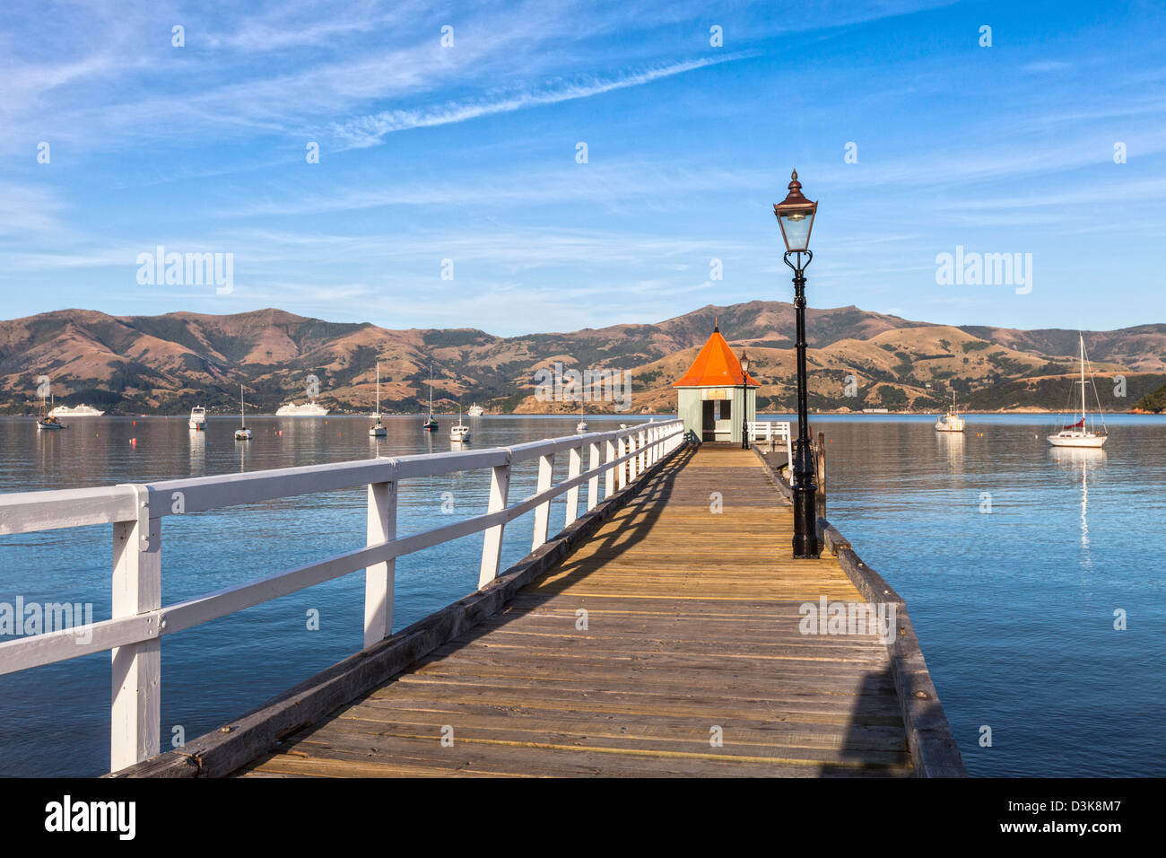 Jetty in Akaroa, on Akaroa Harbour, New Zealand. Stock Photo