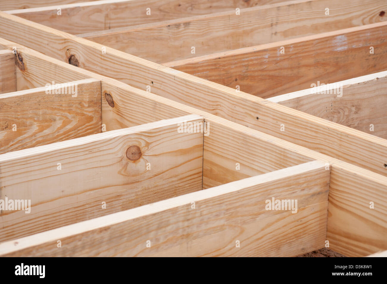 Floor joists made of lumber on construction site Stock Photo