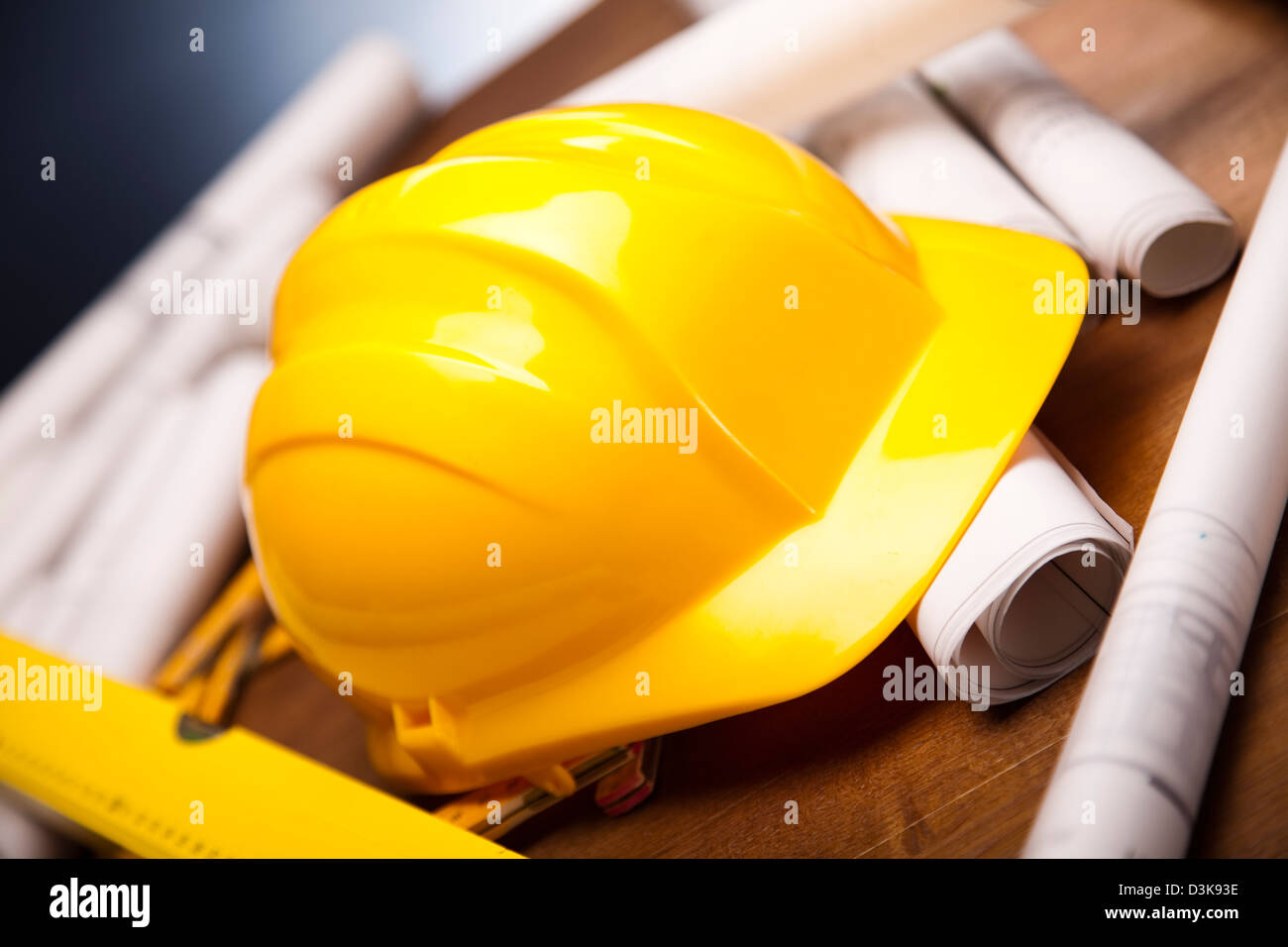 Construction Plans and yellow hard hat Stock Photo Alamy