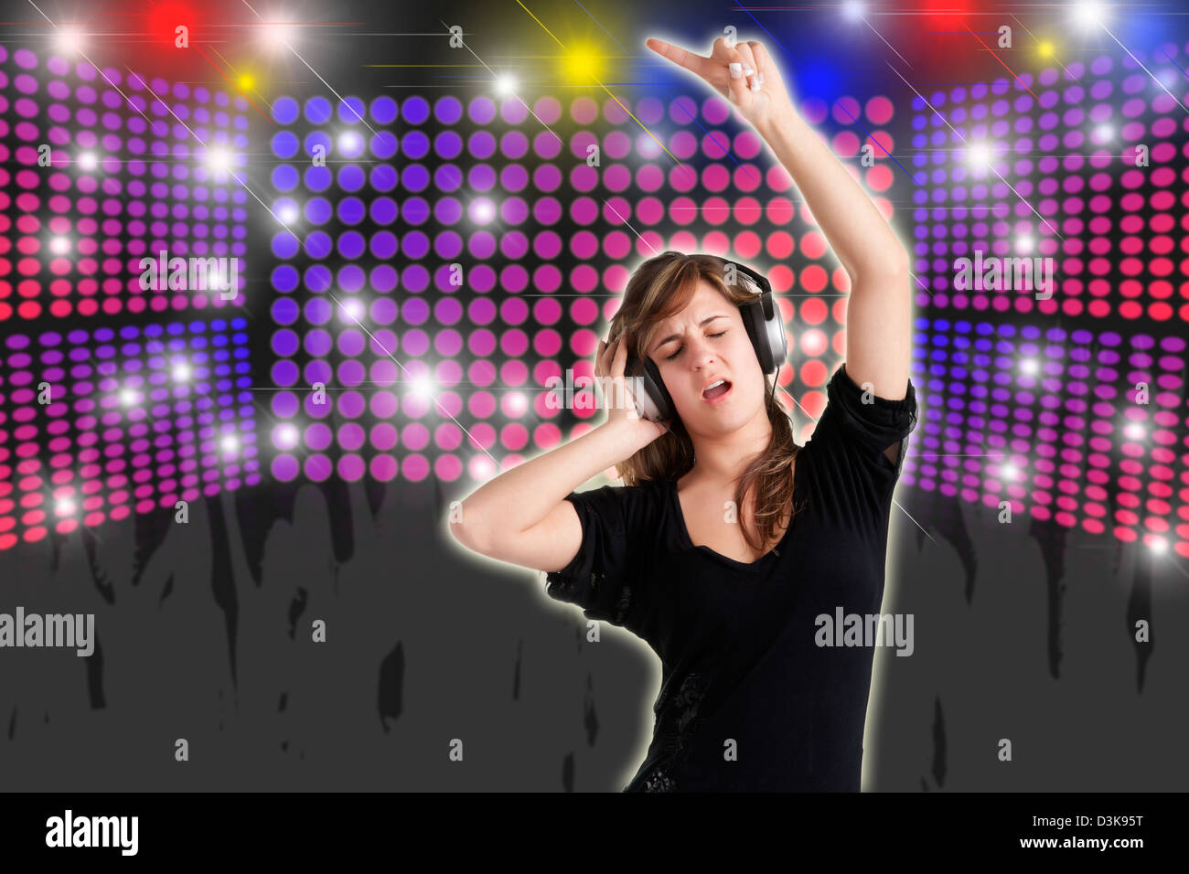 Woman dancing using headphones with disco lights in the background