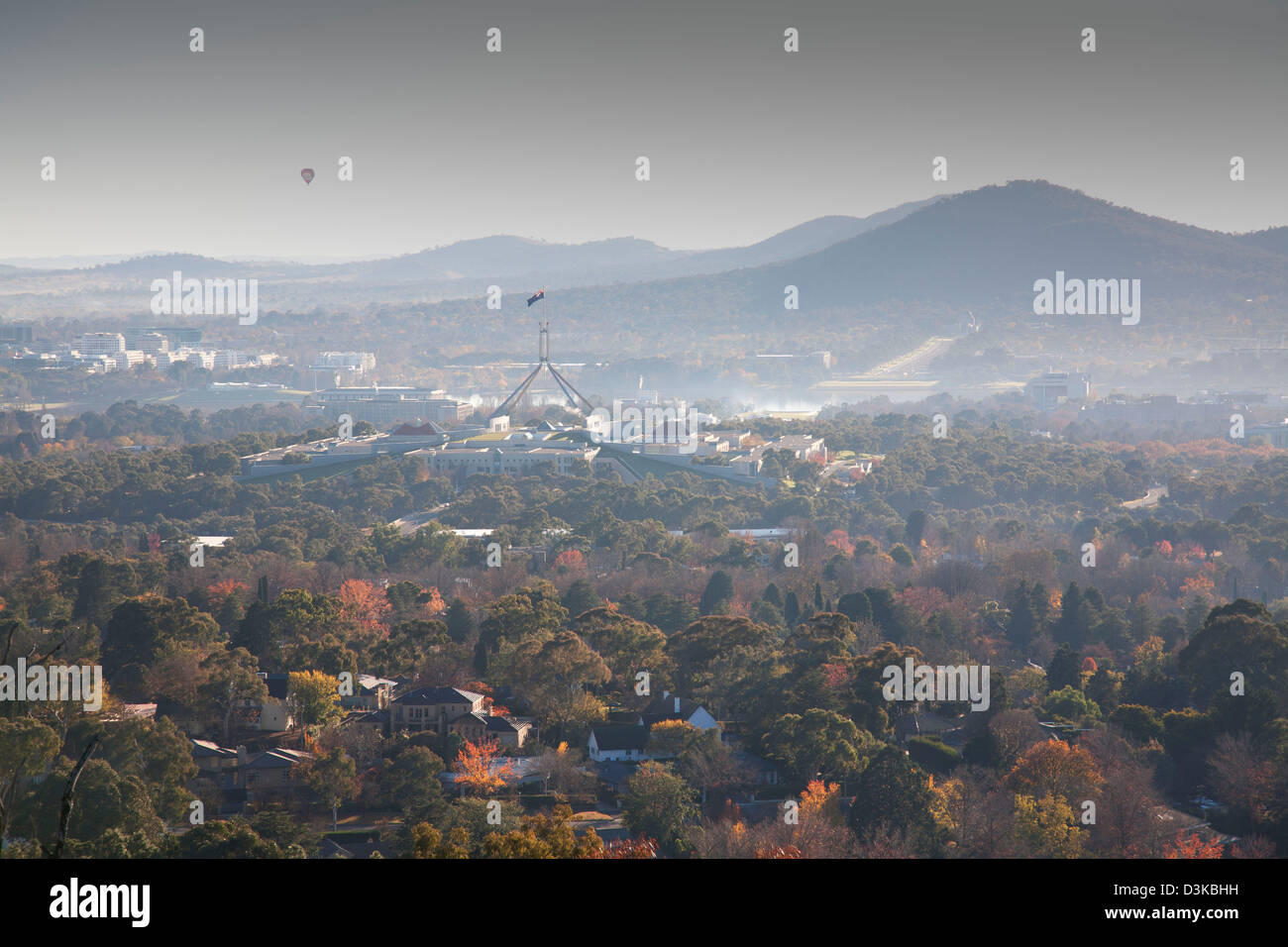 Tourist Hot Air Balloon over Lake Burley Griffin and Parliament House Canberra Australia Stock Photo