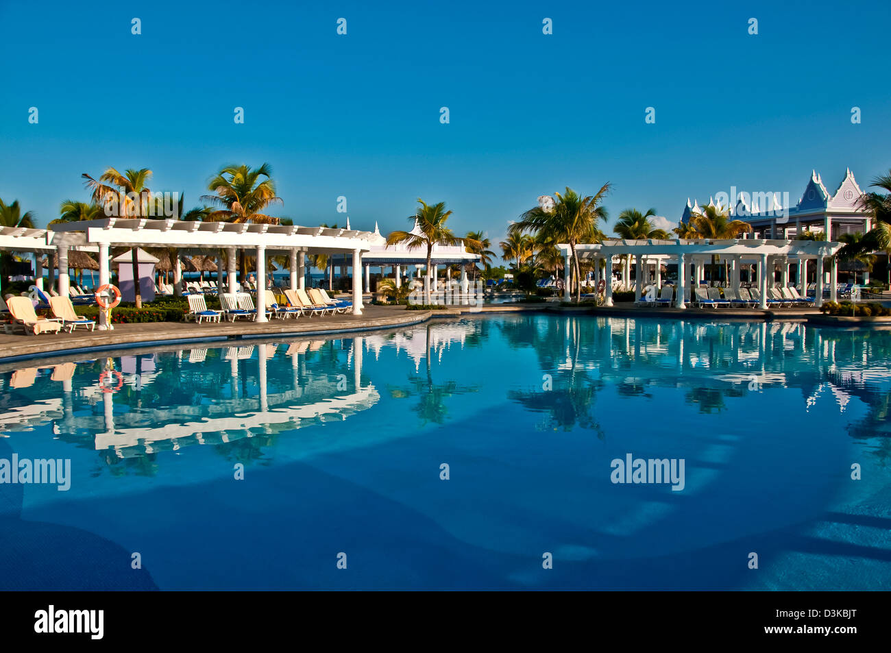 Swimming pool with bright reflections at Hotel Riu Montego Bay all-inclusive resort, no people Stock Photo
