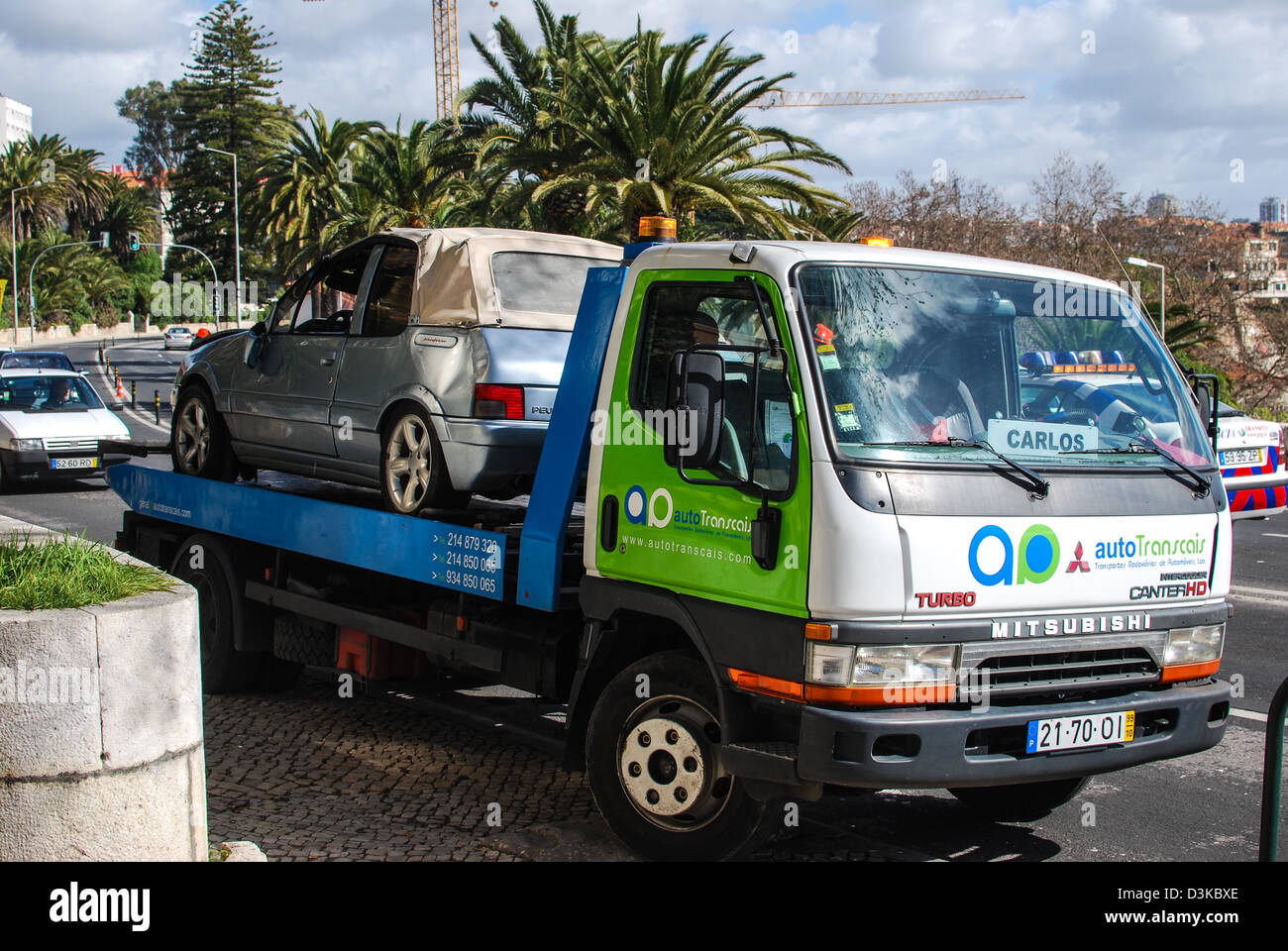 A crashed car is driven away Stock Photo - Alamy
