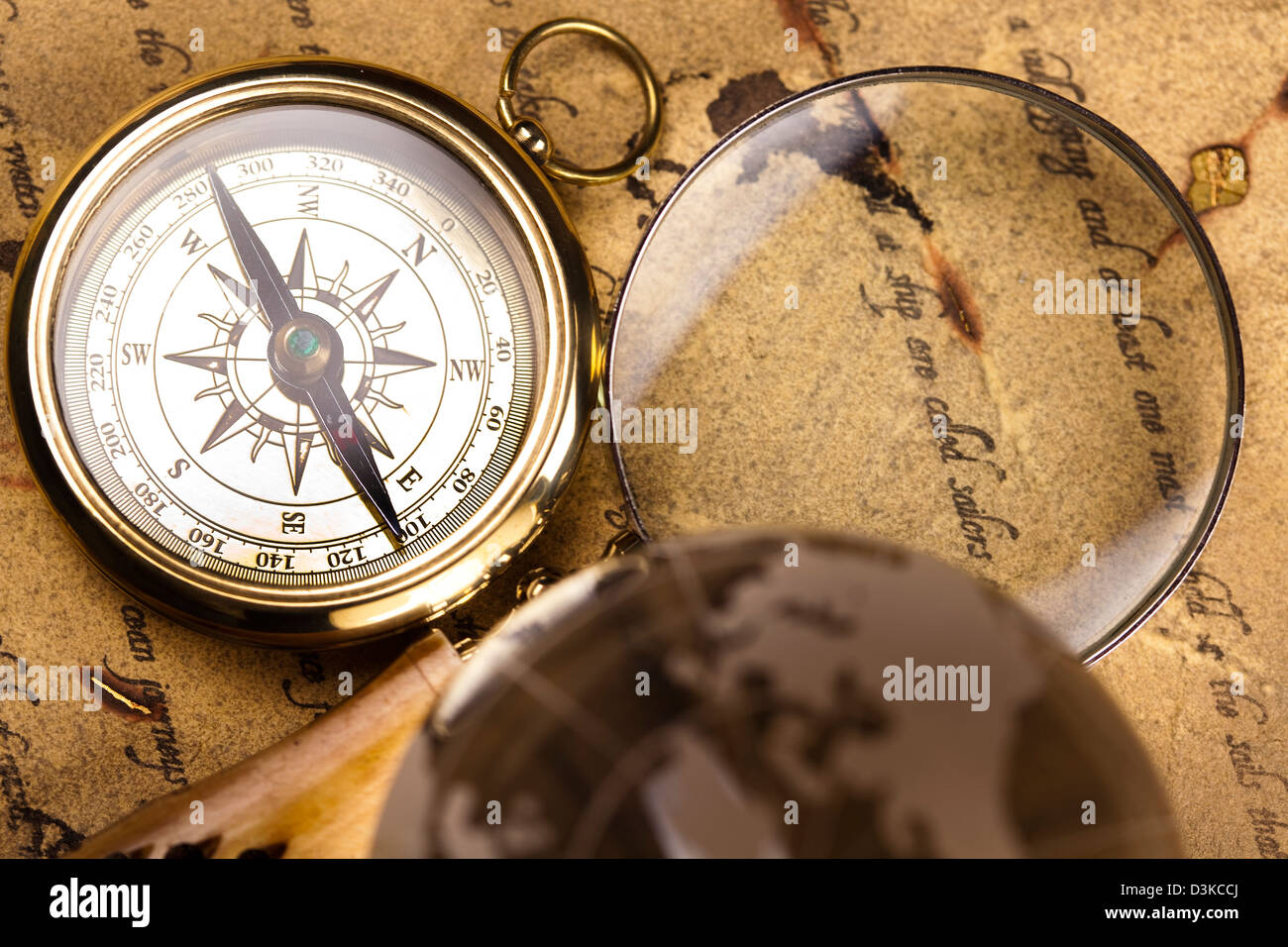 Magnifying glass and  Compass Stock Photo