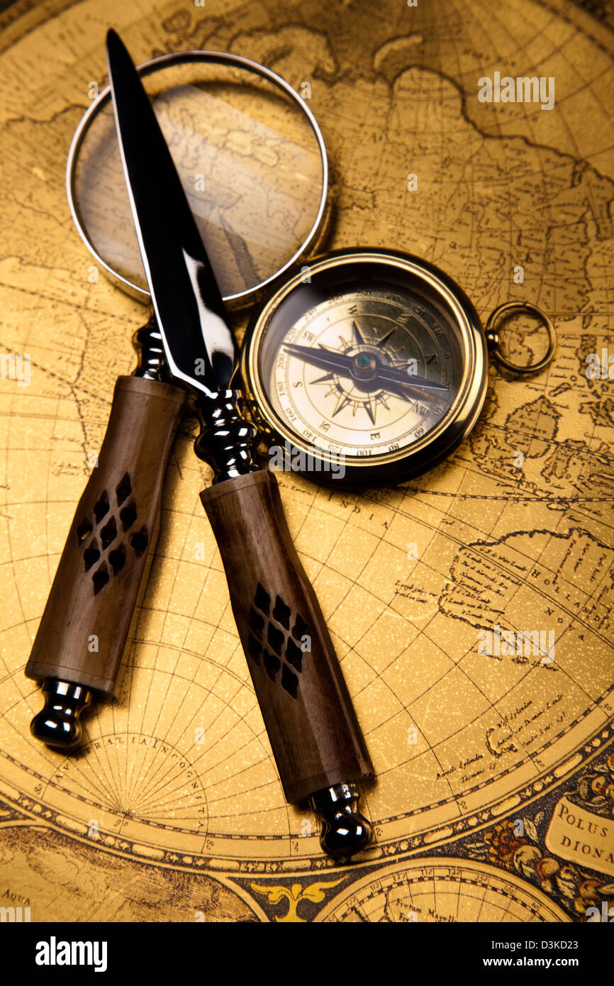 Magnifying glass and  Compass Stock Photo