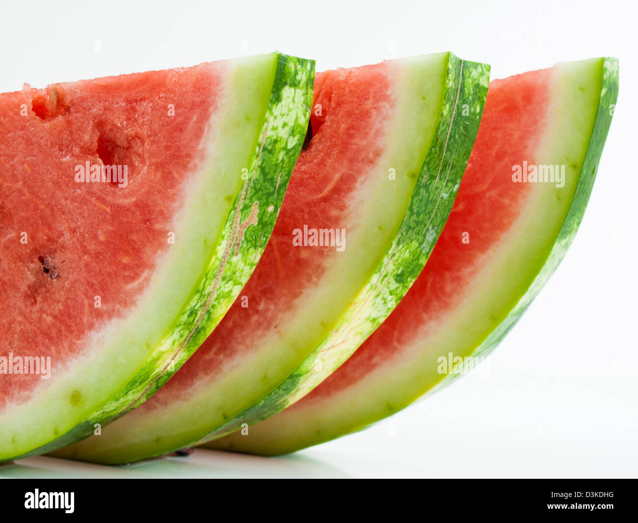Fresh slices of watermelon on white background Stock Photo - Alamy