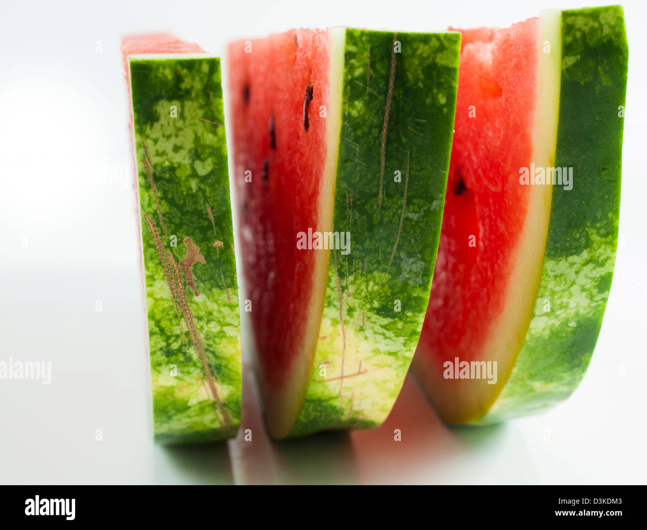 Fresh slices of watermelon on white background Stock Photo - Alamy