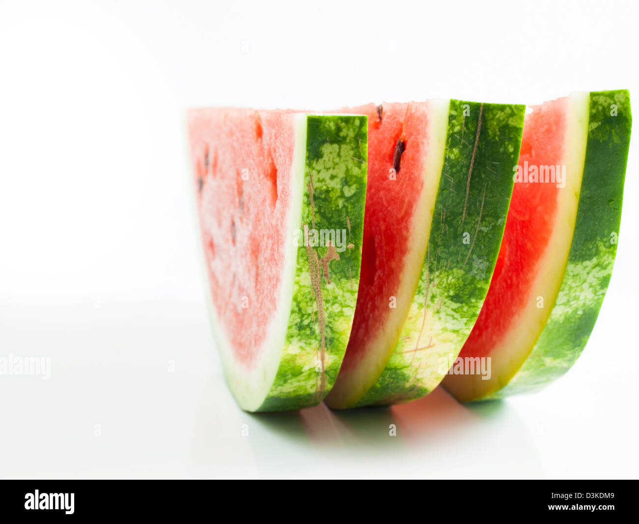 Fresh slices of watermelon on white background Stock Photo - Alamy