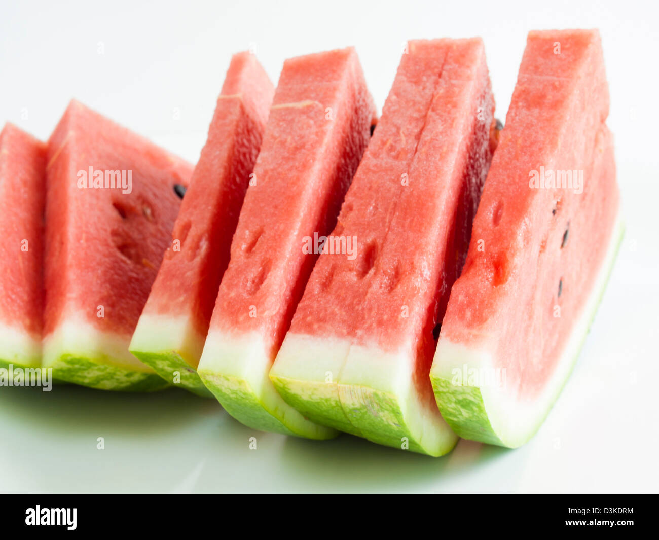 Fresh slices of watermelon on white background Stock Photo - Alamy