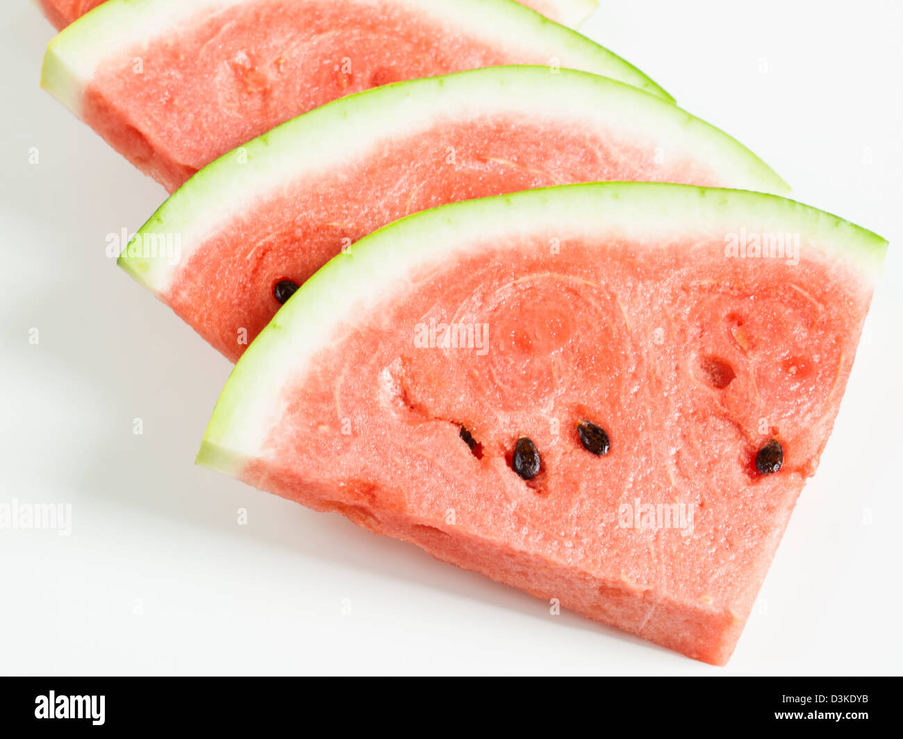 Fresh slices of watermelon on white background Stock Photo - Alamy