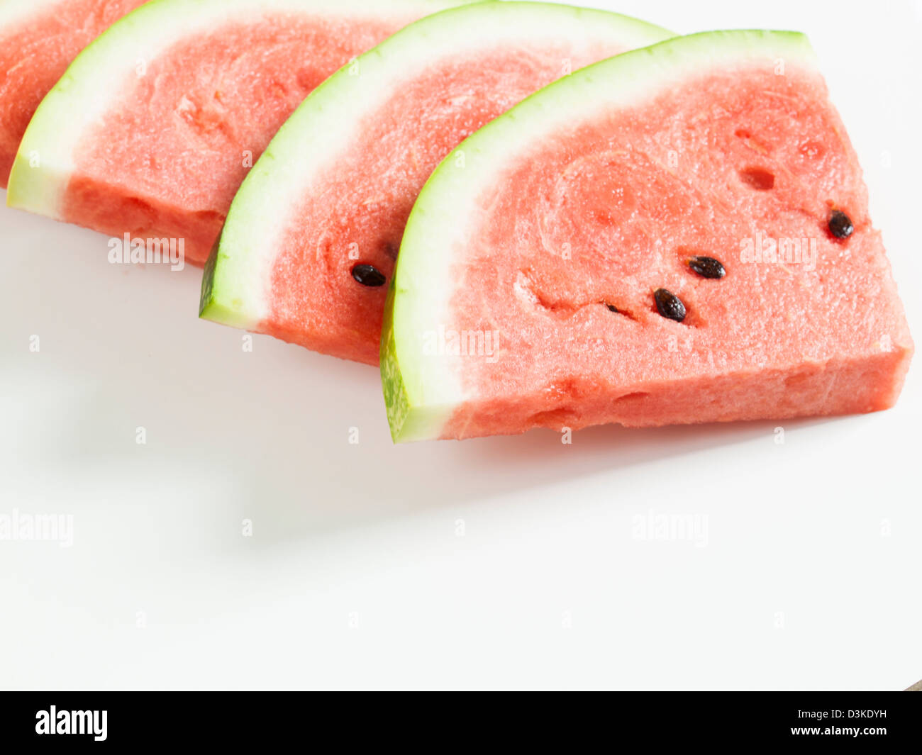 Fresh slices of watermelon on white background Stock Photo - Alamy