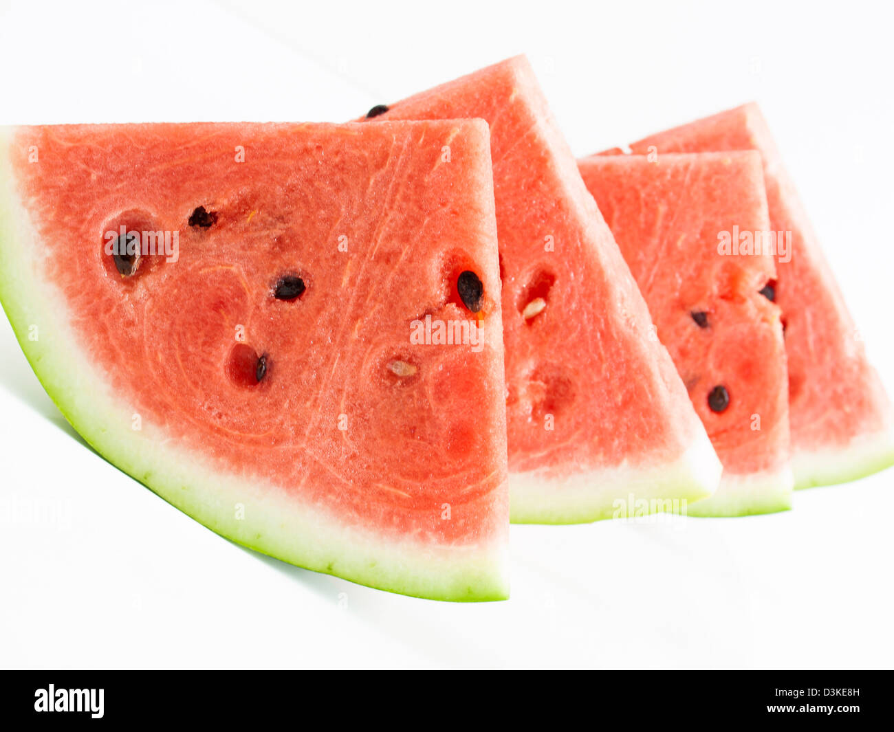 Fresh slices of watermelon on white background Stock Photo - Alamy