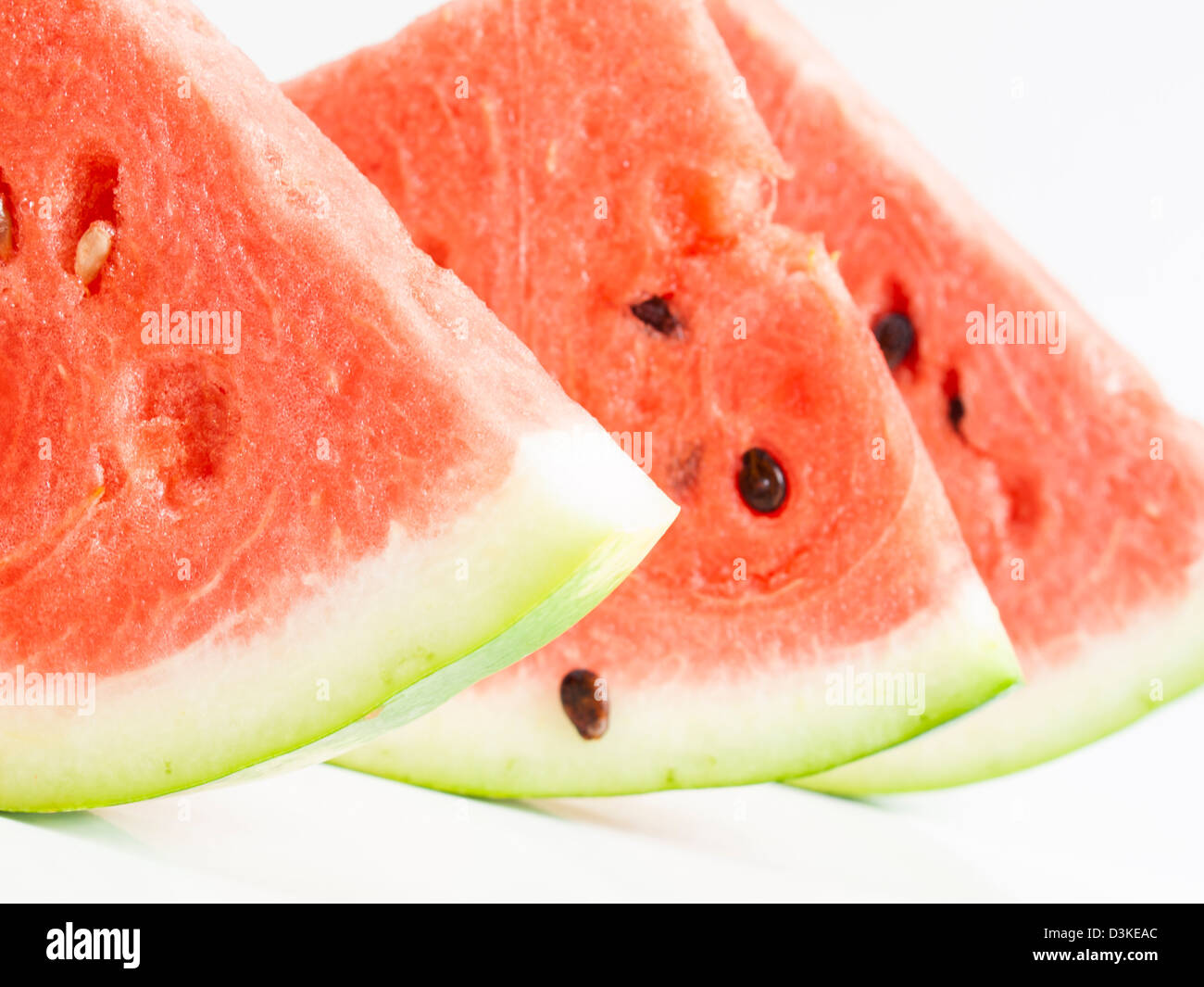 Fresh slices of watermelon on white background Stock Photo - Alamy