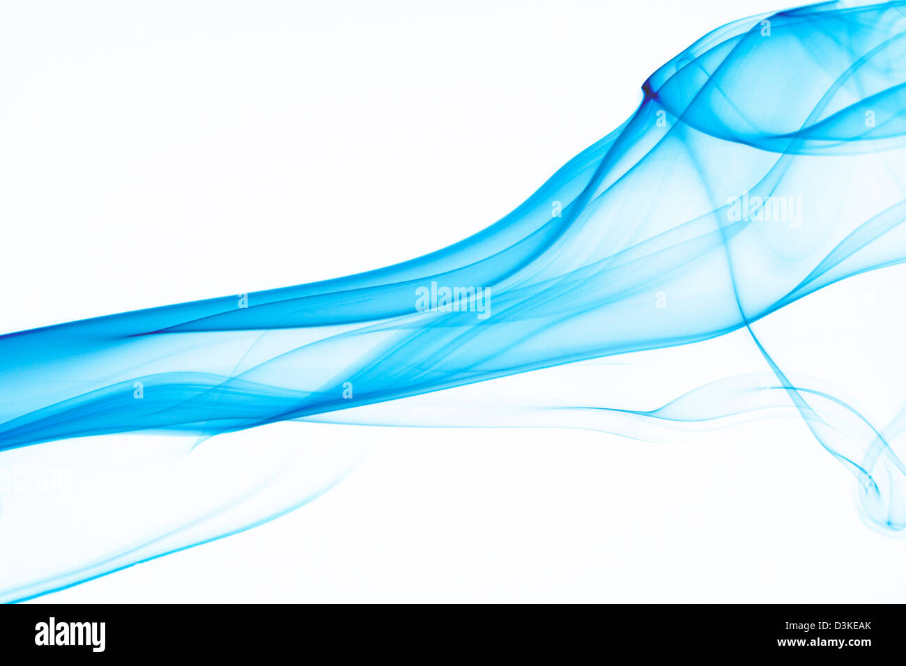 Blue smoke on white background Stock Photo - Alamy