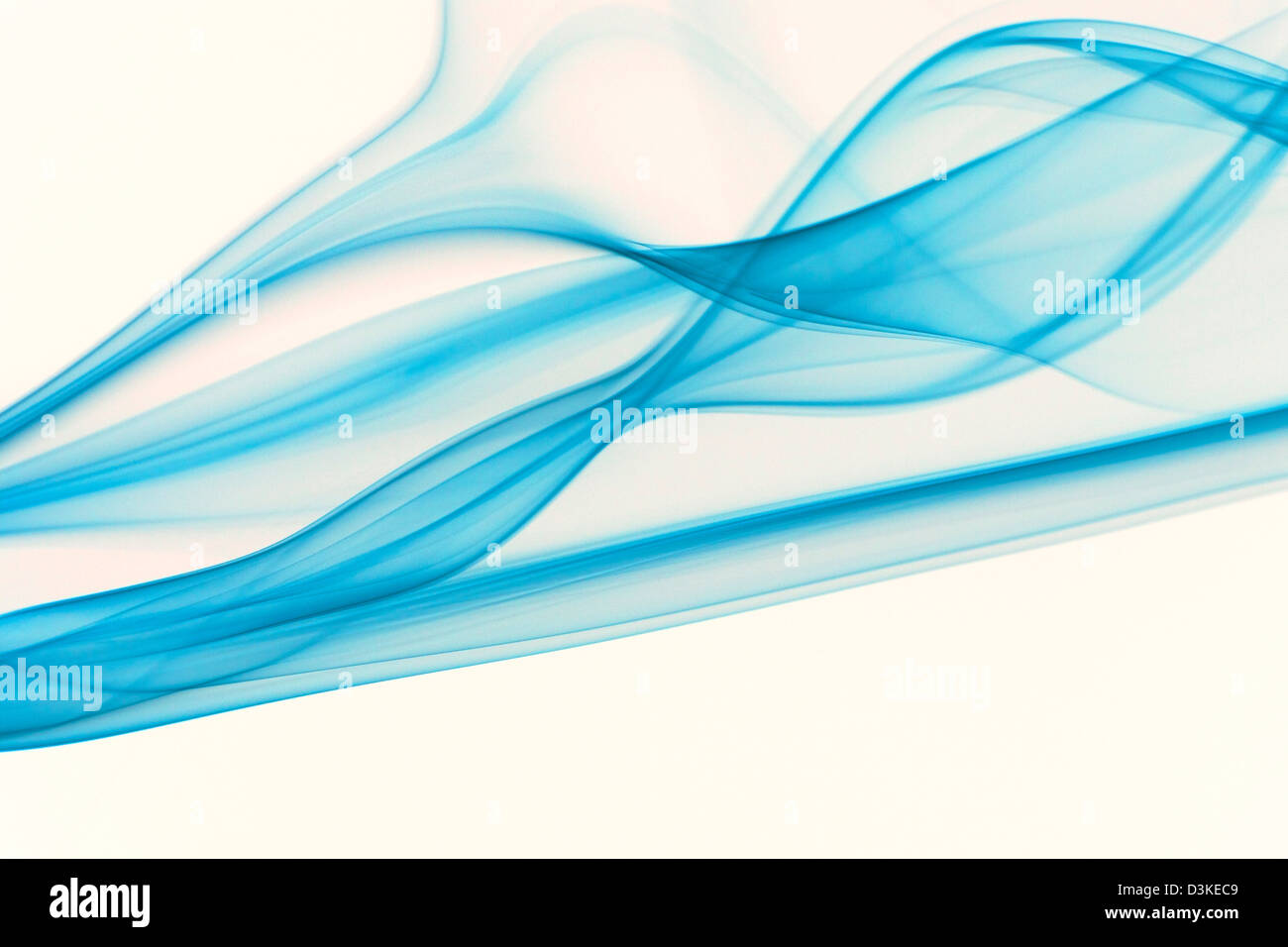 Blue smoke on white background Stock Photo - Alamy