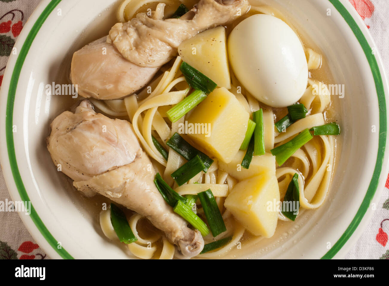 caldo de gallina, the classic Peruvian chicken noodle soup Stock Photo