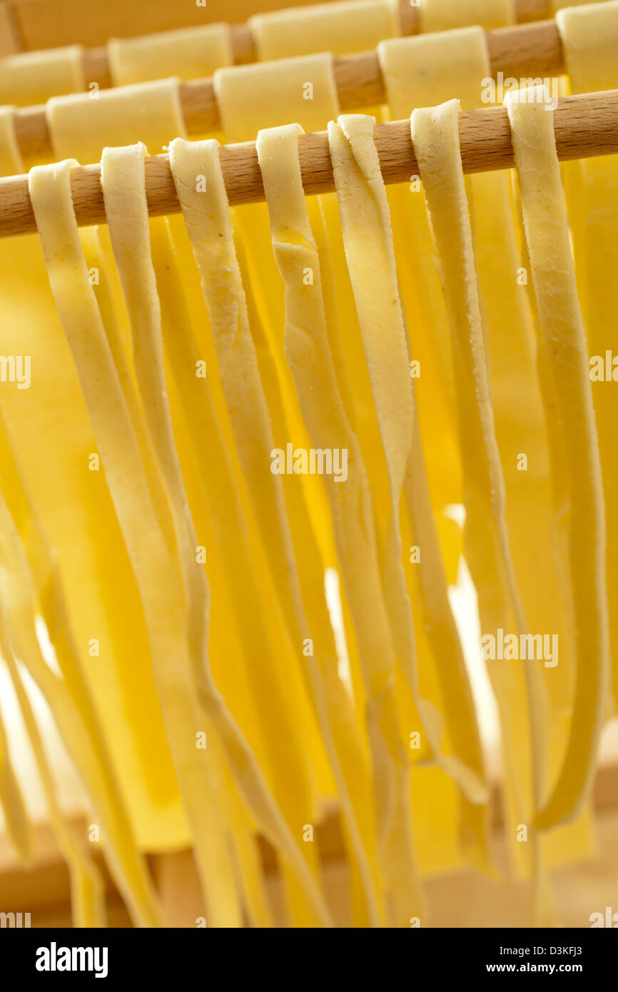 Fresh semolina noodles hanging to dry Stock Photo Alamy