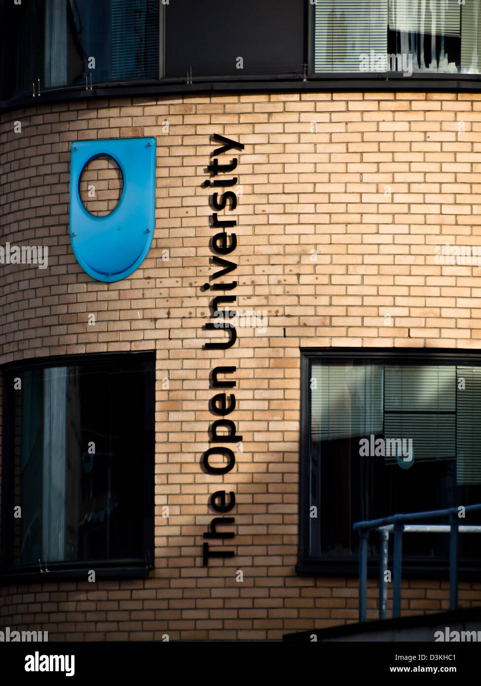 The logo of the Open University adorns the wall of its offices in Camden, London. Stock Photo