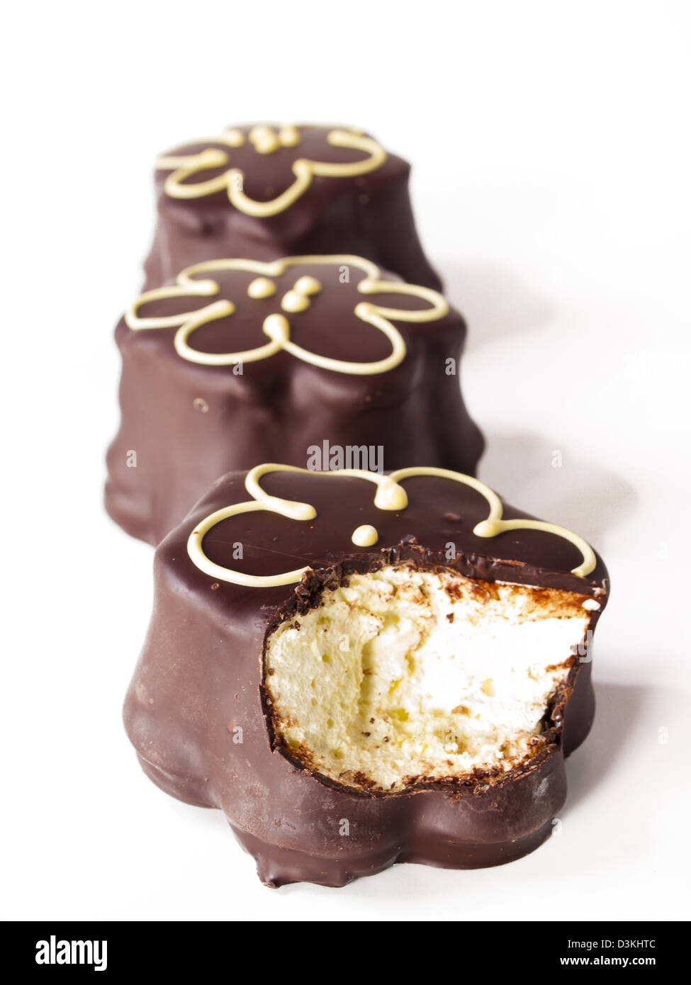 Gourmet chocolate covered passion fruit marshmallows on white