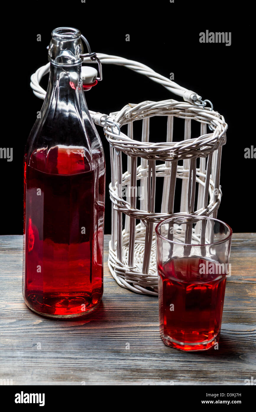 Old bottles with red juice Stock Photo Alamy