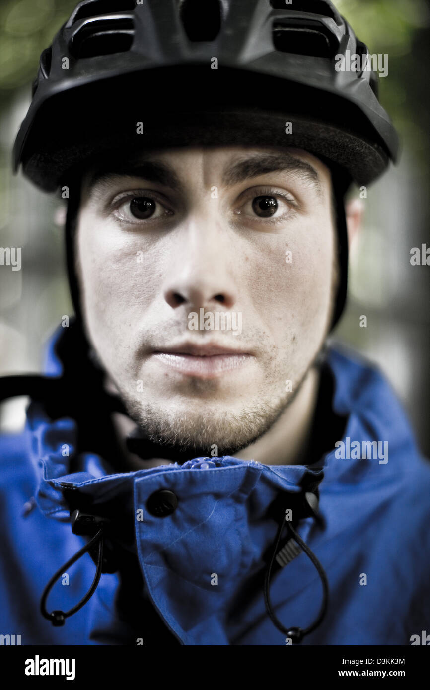 Portrait of mountain biker, Esher forest, England Stock Photo