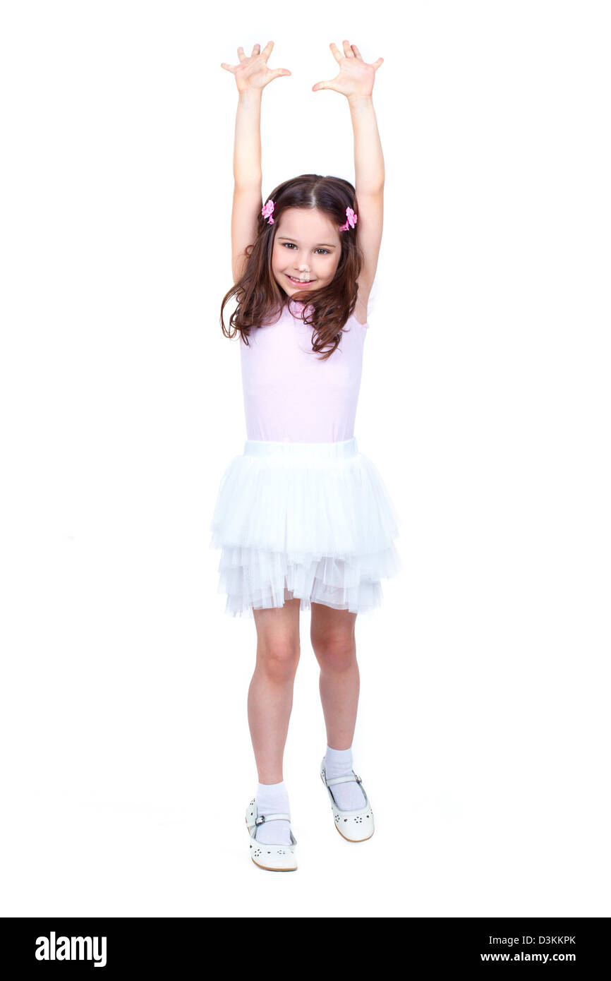 Full length portrait of a cute little girl isolated on white background ...