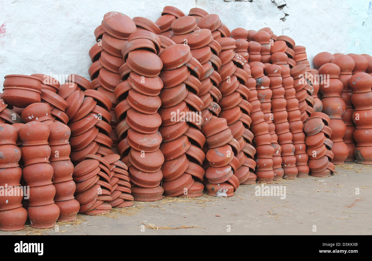 Earthen pots used for Pongal festival kept for sale on the roadside