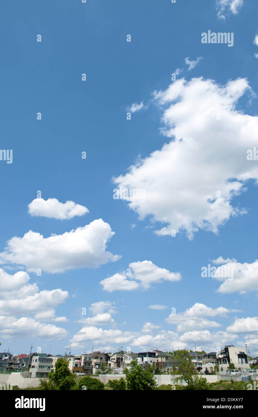 Residential area and blue sky with clouds Stock Photo - Alamy