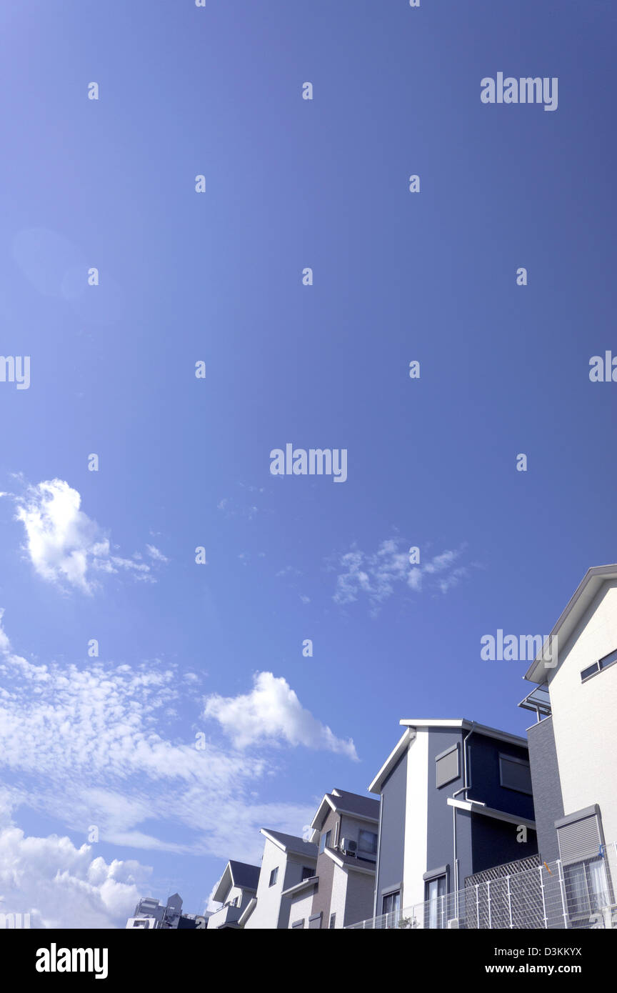 Residential area and blue sky with clouds Stock Photo - Alamy