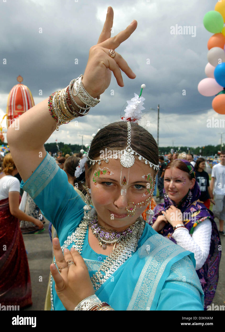 (dpa) - Indian Radha Madhava, a member of the Hare Krishna movement, dances on the premises of the openair music festival 'Przystanek Woodstock 2005' (Train Stop Woodstock 2005) in the border town of  Kostrzyn, Poland, Thursday, 08 August 2005. In the  city, located 80 kilometres from Berlin, Poland's biggest music spectacle takes place from 05 Agust to 06 August 2005. The festival Stock Photo