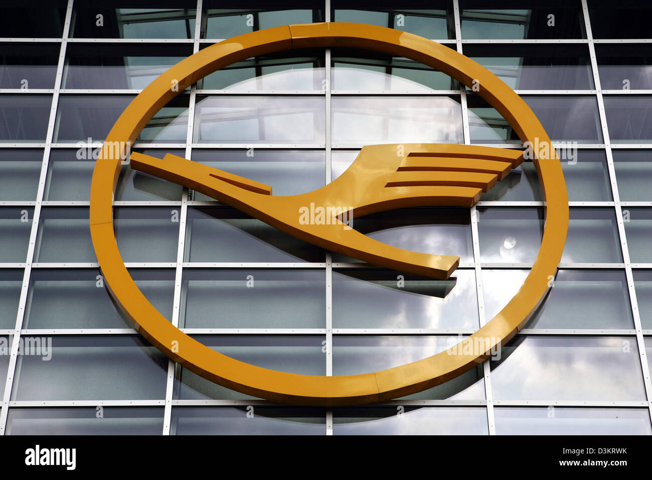 (dpa) - The Lufthansa logo is pictured on the facade of a building at the airport in Frankfurt Main, Germany, 23 August 2005. Photo:Frank May Stock Photo